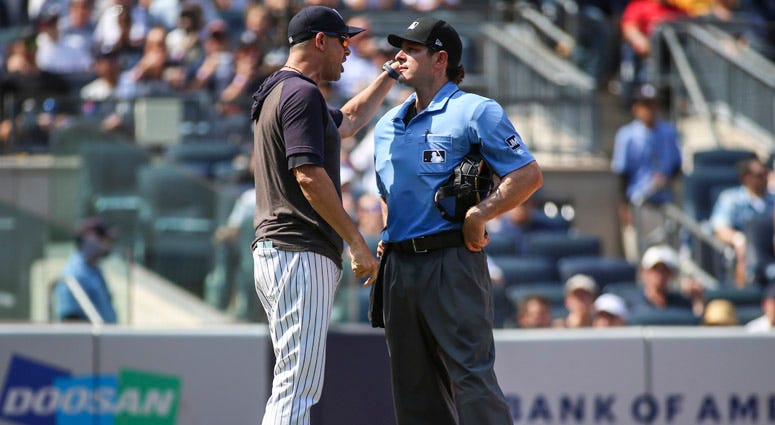 Yankees manager Aaron Boone argues with home plate umpire Ben May on Aug. 17, 2019, at Yankee Stadium. Yankees manager Aaron Boone argues with home plate umpire Ben May on Aug. 17, 2019, at Yankee Stadium.