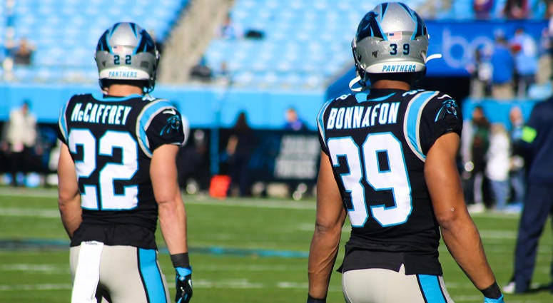 Panthers RBs CMC and Reggie Bonnafon