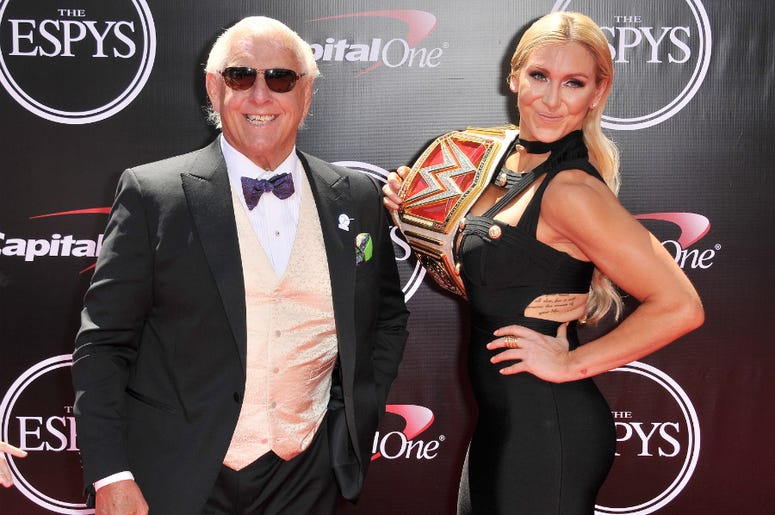 Ric Flair and WWE Diva Charlotte arrives at The 2016 ESPYS held at the Microsoft Theater in Los Angeles, CA on Wednesday, July 13, 2016. Ric Flair and WWE Diva Charlotte arrives at The 2016 ESPYS held at the Microsoft Theater in Los Angeles, CA on Wednesday, July 13, 2016.