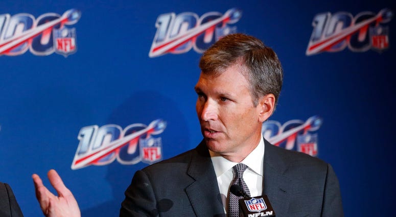 Dr. Allen Sills speaks during a news conference at the at the football league's fall meeting in Fort Lauderdale, Fla. The NFL's chief medical officer says it's not surprising there have been positive tests for COVID-19 among players reporting to camp.