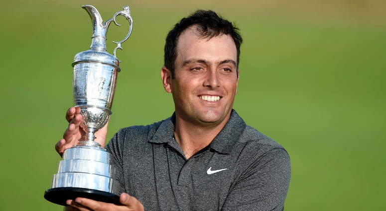 Francesco Molinari holds the Claret Jug after winning the 147th Open Championship. Francesco Molinari holds the Claret Jug after winning the 147th Open Championship.