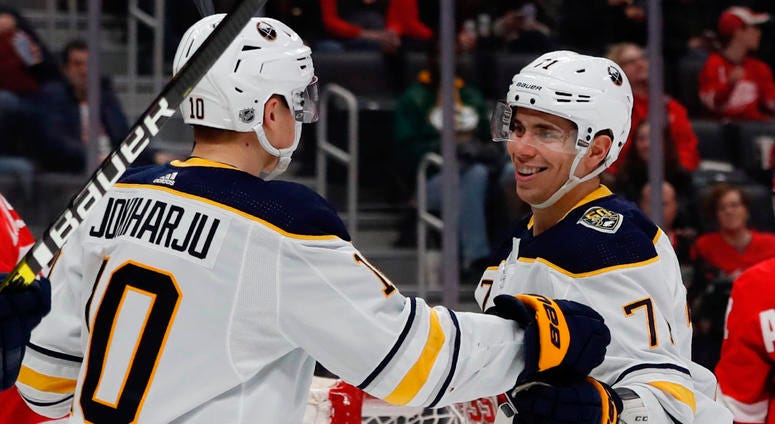 Henri Jokiharju and Evan Rodrigues