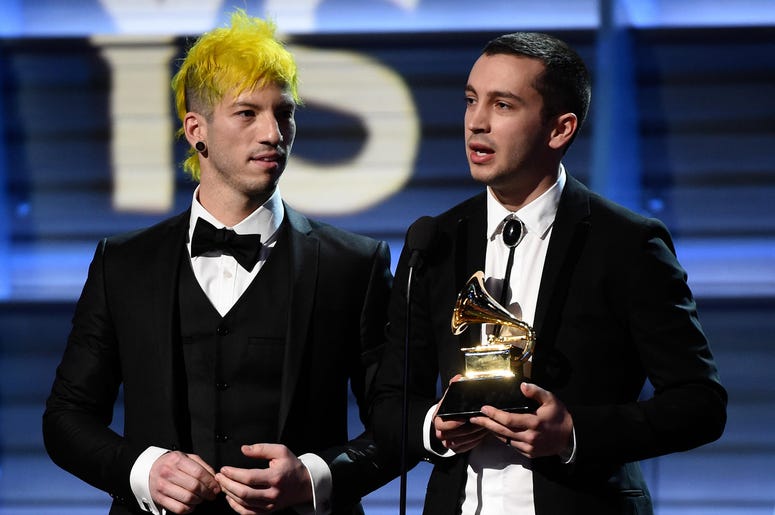 Josh Dun (L) and Tyler Joseph of Twenty One Pilots accept the Best Pop Duo/Group Performance award Josh Dun (L) and Tyler Joseph of Twenty One Pilots accept the Best Pop Duo/Group Performance award