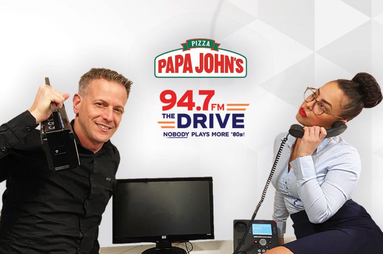 94.7 The Drive's Office of the Week Contest Corinna and Jason of 94.7 The Drive