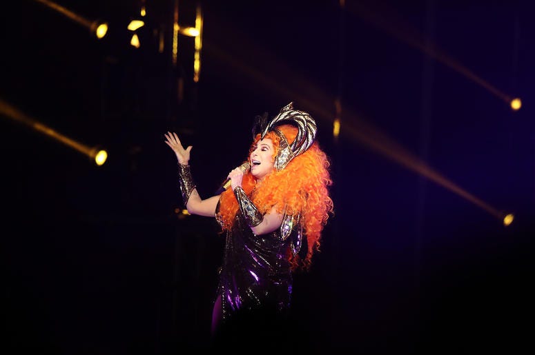 Cher Sining With Head Piece On