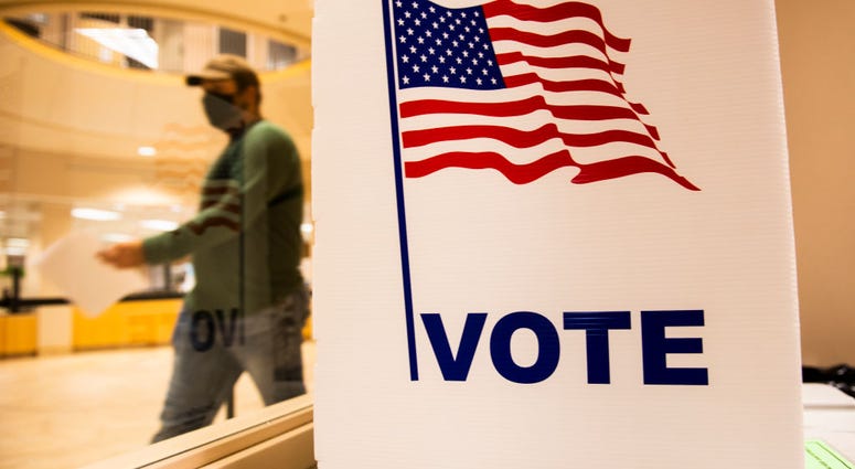 A voter leaves after filling out their ballot at the Beltrami County Administration building on September 18, 2020 in Bemidji, Minnesota
