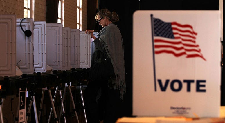Teri Rogers casts her vote at a polling station in St Andrew Presbyterian Church March 6, 2012 in Sandy Springs, Georgia.