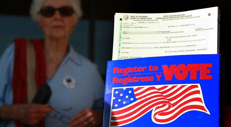 Voter registration cards are displayed on a table sponsored by the League of Women Voters of Diablo Valley October 20, 2008 in Lafayette, California.