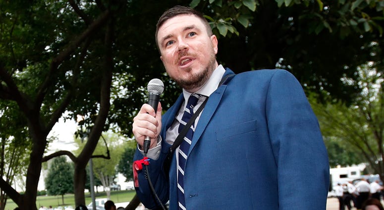 White nationalist Jason Kessler talks during a rally near the White House on the one year anniversary of the Charlottesville "Unite the Right" rally Jason Kessler