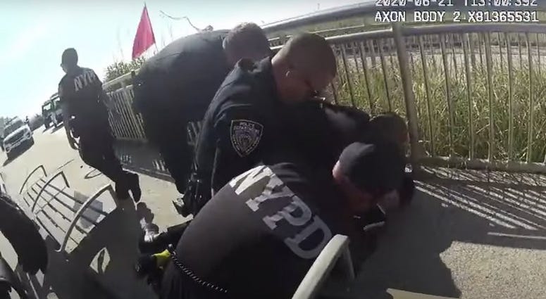 A screenshot of the NYPD arrest. NYPD chokehold arrest