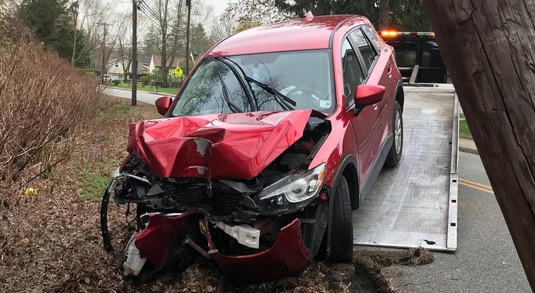 The crash scene. Driver in N95 mask crashes