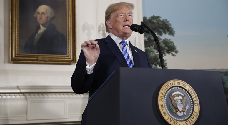 President Donald Trump delivers a statement on the Iran nuclear deal from the Diplomatic Reception Room of the White House, Tuesday, May 8, 2018, in Washington. Donald Trump