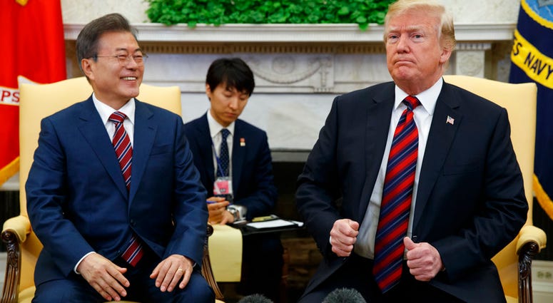 President Donald Trump meets with South Korean President Moon Jae-In in the Oval Office of the White House, Tuesday, May 22, 2018, in Washington.