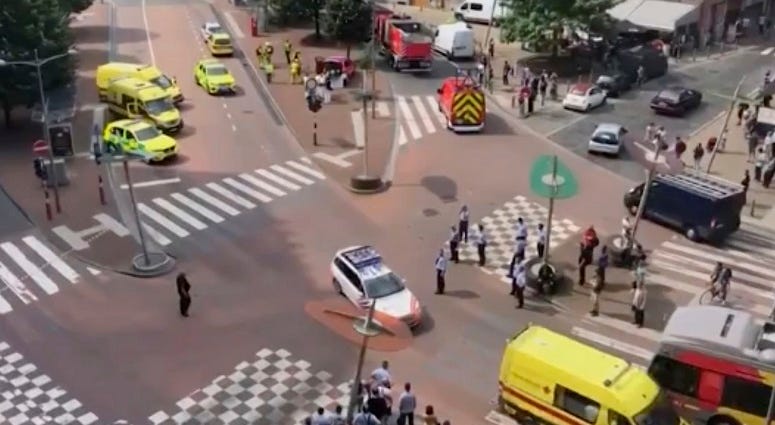 In this grab taking from video Tuesday, May 29, 2018,emergency services arrive at the scene after a shooting incident, in Liege, Belgium. Belgium Attack