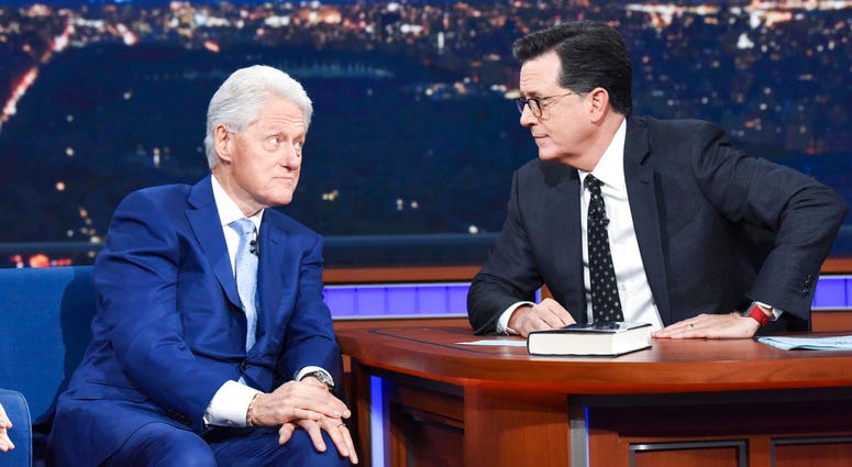Bill Clinton and Stephen Colbert