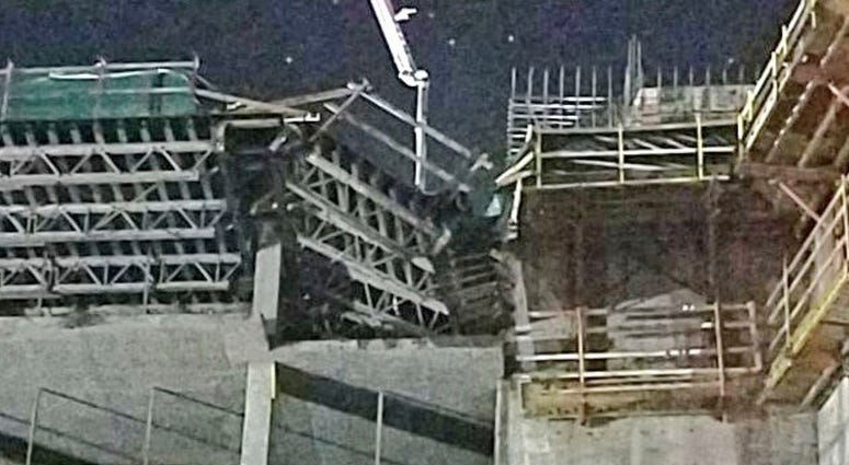 This shows the collapsed scaffolding, top center, at a hotel under construction after two workers fell to their deaths early Wednesday, Aug. 29, 2018, near Orlando, Fla. This shows the collapsed scaffolding, top center, at a hotel under construction after two workers fell to their deaths early Wednesday, Aug. 29, 2018, near Orlando, Fla.
