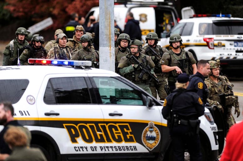 Police respond to the synagogue in Pittsburgh. police at pittsburgh synagogue