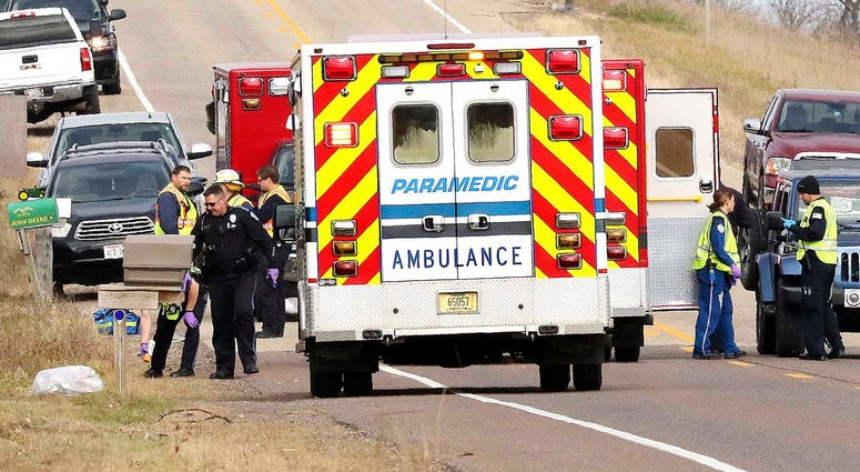 Emergency medical personnel gather at the scene of a hit-and-run accident Saturday, Nov. 3, 2018, in Lake Hallie, Wis., that killed two girls and an adult. Girl Scouts killed crash