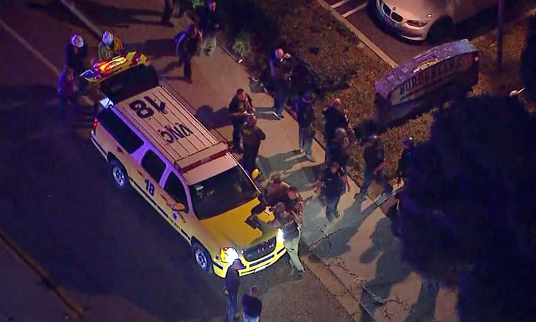 This image made from aerial video show officers around a Police SUV in the vicinity of a shooting in Thousand Oaks, California, early Thursday, Nov. 8, 2018. This image made from aerial video show officers around a Police SUV in the vicinity of a shooting in Thousand Oaks, California, early Thursday, Nov. 8, 2018.