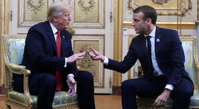 President Donald Trump meets with French President Emmanuel Macron inside the Elysee Palace in Paris Saturday Nov. 10, 2018. trump macron