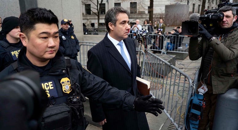 In this Dec. 12, 2018, photo, Michael Cohen, President Donald Trump's former lawyer, leaves federal court after his sentencing in New York. Michael Cohen