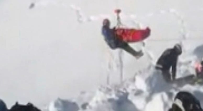 In this grab taken from validated UGC provided on Thursday, Dec. 27, 2018, a boy is airlifted after an avalanche, on the French Alps on Wednesday. In this grab taken from validated UGC provided on Thursday, Dec. 27, 2018, a boy is airlifted after an avalanche, on the French Alps on Wednesday.