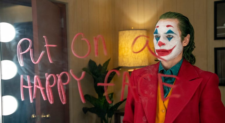 Joaquin Phoenix as the Joker Joaquin Phoenix as The Joker
