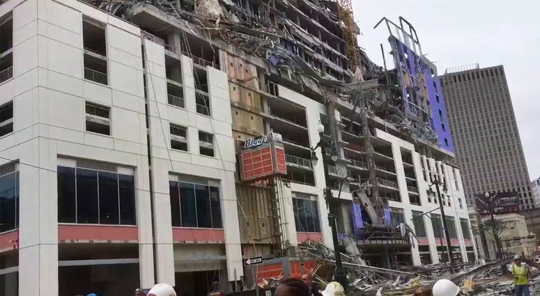 This photo provided by WWL-TV shows several construction standing after a large portion of the Hard Rock Hotel, under construction suddenly collapsed Saturday, Oct. 12, 2019 in New Orleans. New Orleans hotel collapse
