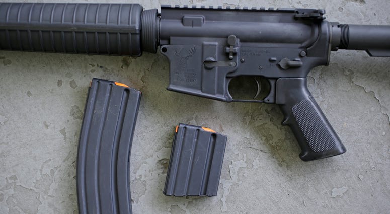 Stag arms AR-15 rifle with 30 round, left, and 10 round magazines Stag arms AR-15 rifle with 30 round, left, and 10 round magazines