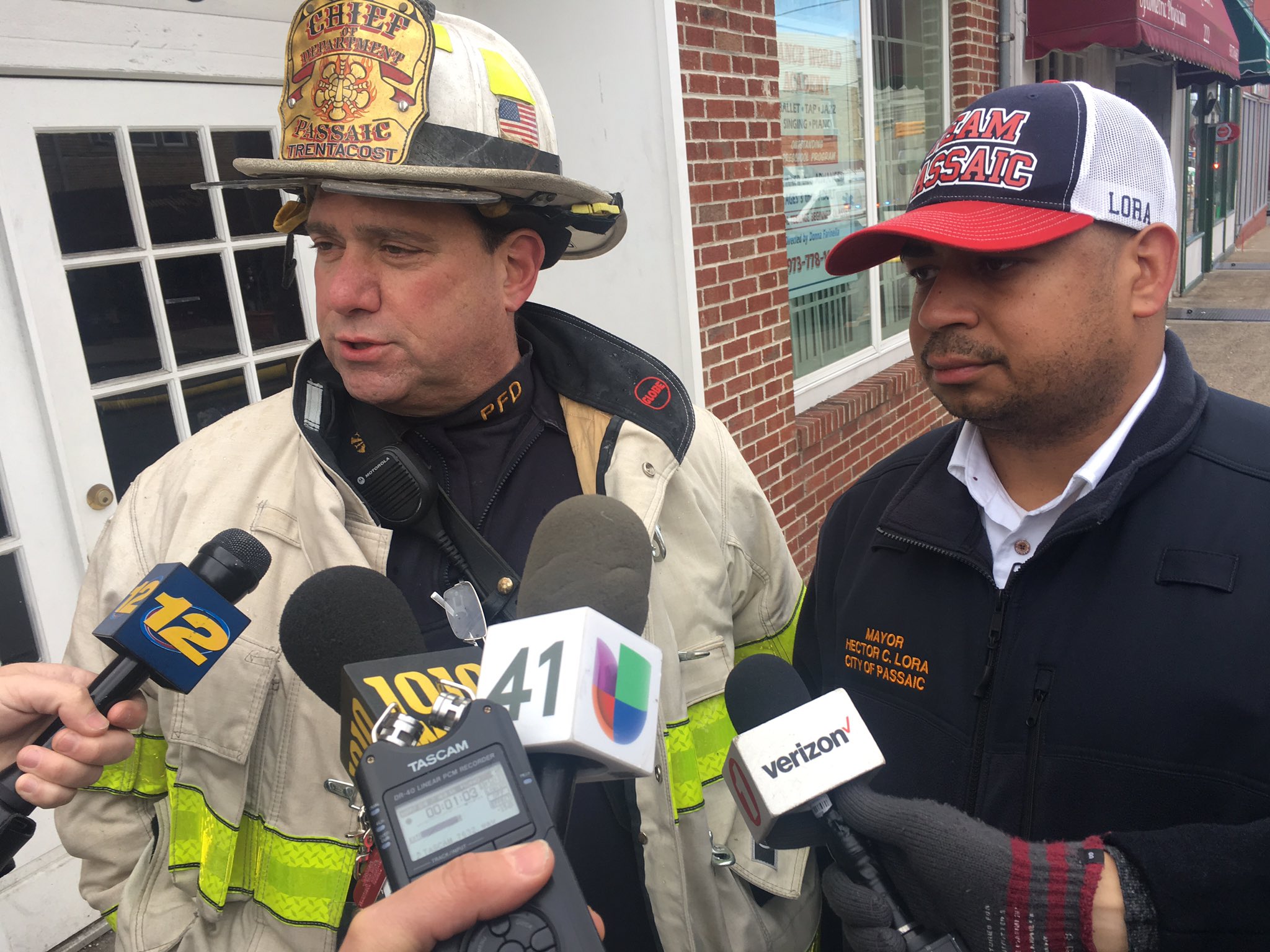 Passaic Mayor Hector Lora and Fire Chief Trentacost discuss fire at King Of Delancey restaurant. Passaic Mayor Hector Lora and Fire Chief Trentacost discuss fire at King Of Delancey restaurant.