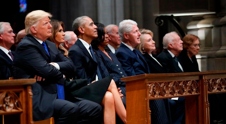 From left, President Donald Trump, first lady Melania Trump, former President Barack Obama, former first lady Michelle Obama, former President Bill Clinton, former Secretary of State Hillary Clinton, and former President Jimmy Carter. George H.W. Bush