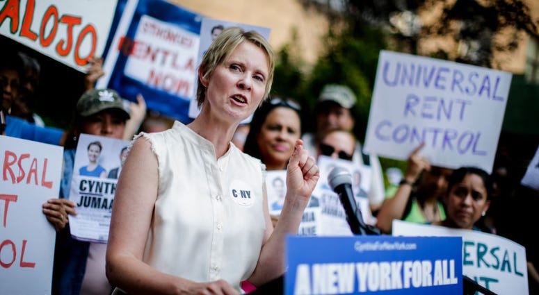 NEW YORK, NY - AUGUST 16: Democratic gubernatorial candidate Cynthia Nixon speaks to attendees during a rally for universal rent control on August 16, 2018 in New York City.