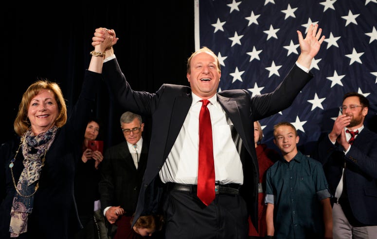 Democratic Colorado Governor-elect Jared Polis arrives onstage with running mate Dianne Primavera on November 6, 2018 in Denver, Colorado. (Photo by Rick T. Wilking/Getty Images)