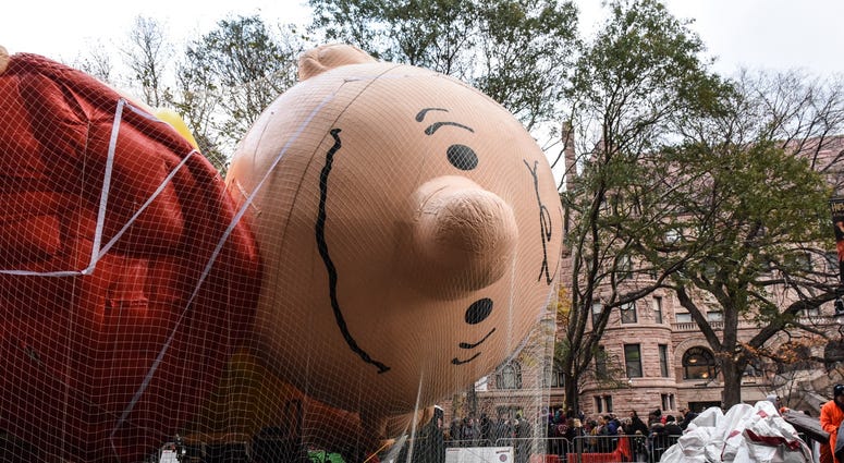 The Charlie Brown balloon lies face down after being inflated by the Macy's inflation team ahead of the Macy's Thanksgiving Day Parade on November 21, 2018 in New York City. Thanksgiving Parade