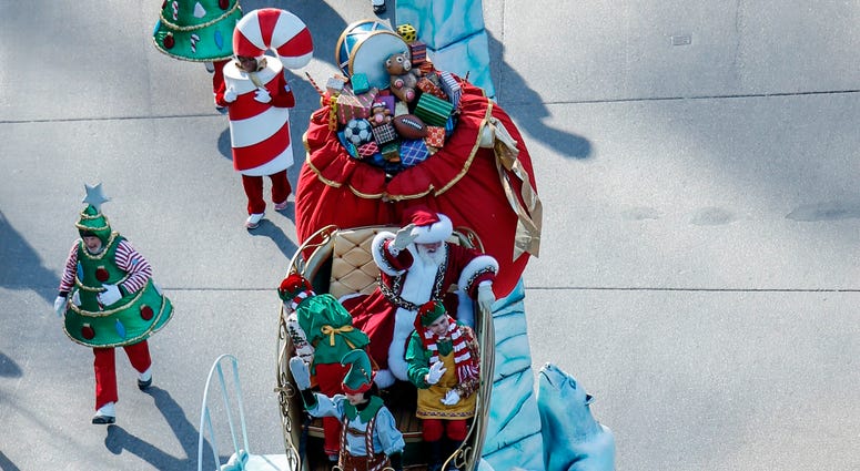 Santa Claus waves during the 92nd annual Macy's Thanksgiving Day Parade on November 22, 2018 in New York City. Thanksgiving Day Parade 2018