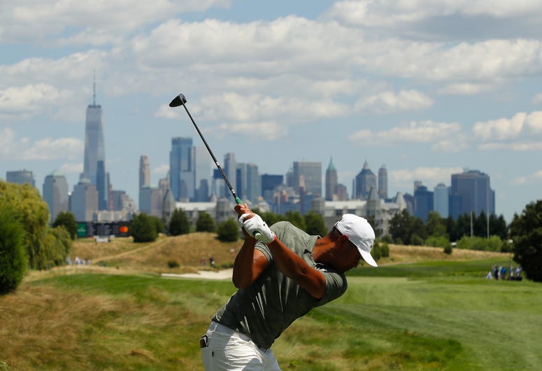 Tony Finau of the United States plays his shot from the tenth tee during the final round of The Northern Trust at Liberty National Golf Club on August 11, 2019 in Jersey City, New Jersey. New Jersey golf course