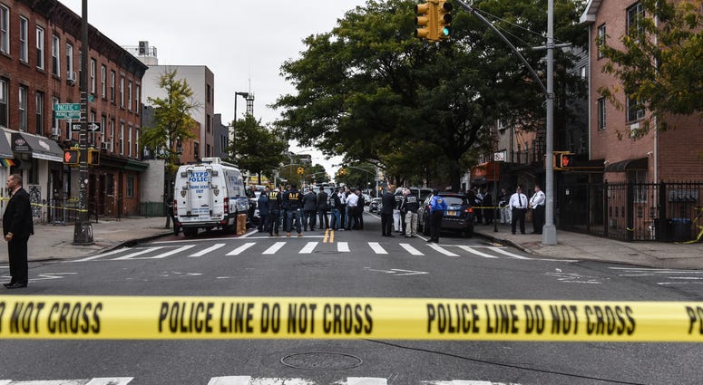 A crime scene is established in front of the Triple A Aces social club on Utica Avenue on October 12, 2019 in New York City. Brooklyn gambling club shooting