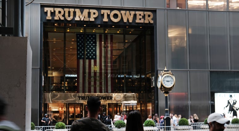 People walk by Trump Tower on September 26, 2019 in New York City. Trump Tower