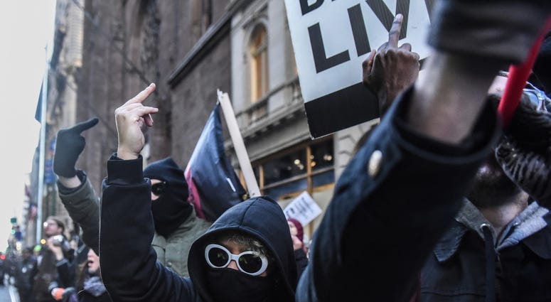 Protesters from various anti-fascist groups rally against the Proud Boys on November 16, 2019 in New York City. Antifa Proud Boys Trump Tower