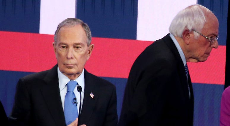 Michael Bloomberg and Bernie Sanders at a Democratic debate. Bloomberg Sanders