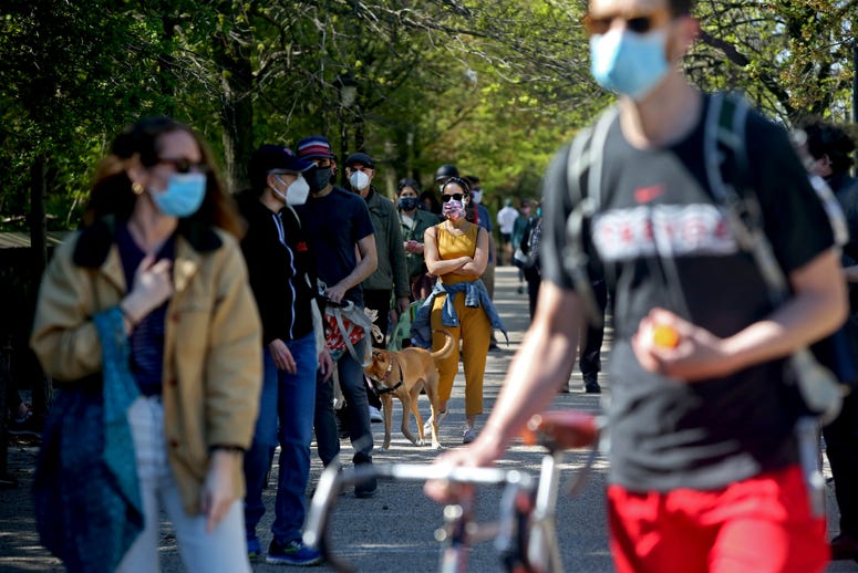 People wait in line to enter Prospect Park Market during nice weekend weather as social distancing guidelines remain in place to limit the spread of coronavirus on May 2, 2020 in New York City Coronavirus NYC