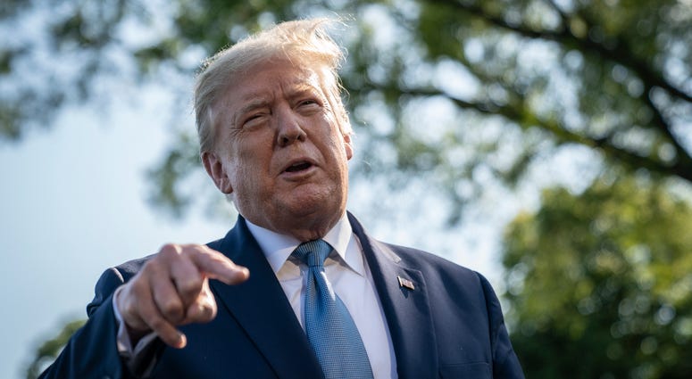 U.S. President Donald Trump speaks to reporters before boarding Marine One on the South Lawn of the White House on May 15, 2020 in Washington, DC. Donald Trump