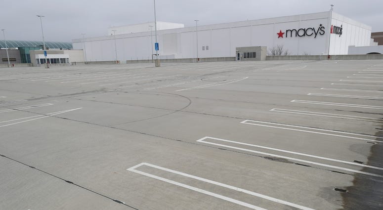 Macy's department store is shown with an empty parking lot at the Roosevelt Field Mall on March 20, 2020 in East Garden City, New York. Coronavirus NYC