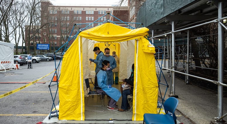 Doctors test hospital staff with flu-like symptoms for COVID-19 at St. Barnabas hospital on March 20, 2020 in New York City. Coronavirus NYC
