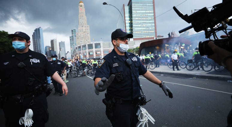 Police confront protesters in front of the Barclay's Center in Brooklyn on May 29, 2020 in New York City. NYC protest