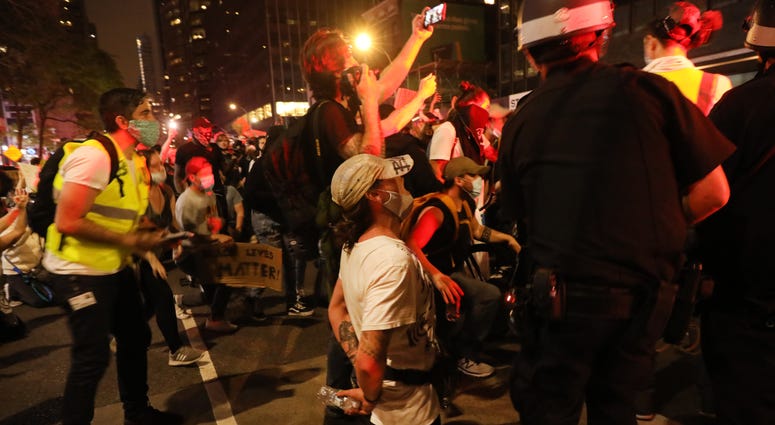 Police prepare to make dozens of arrests as demonstrations continue in Manhattan over the killing of George Floyd by a Minneapolis Police officer on June 03, 2020 in New York City. NYC protest day 7