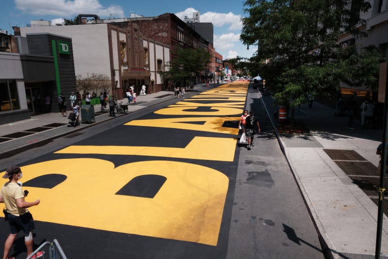 A massive “Black Lives Matter” mural runs covers a city street on June 29, 2020 in the Brooklyn borough of New York City. Black Lives Matter Brooklyn