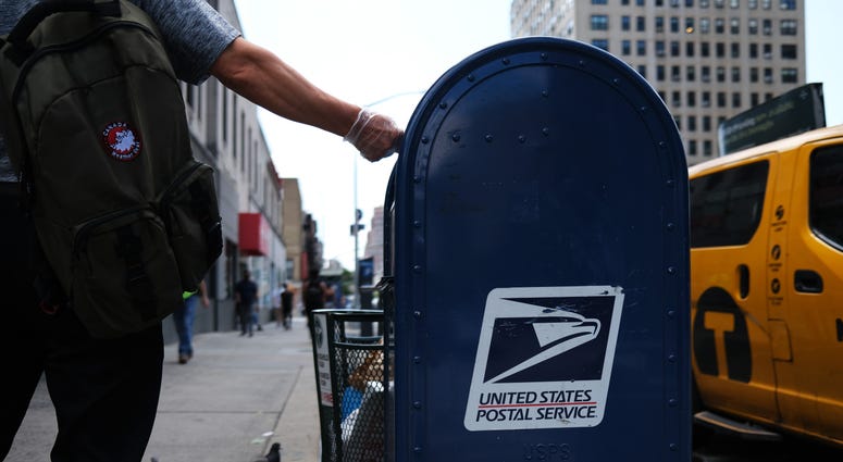 A United States Postal Service (USPS) mail box stands in Manhattan on August 05, 2020 in New York City. Coronavirus NYC