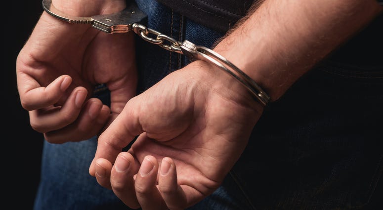 Handcuffed man Handcuffed man