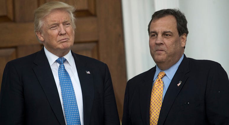 President-elect Donald Trump and New Jersey Governor Chris Christie stand together before their meeting at Trump International Golf Club. President-elect Donald Trump and New Jersey Governor Chris Christie stand together before their meeting at Trump International Golf Club.